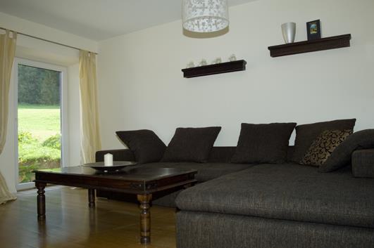 Wohnzimmer mit Schlafsofa