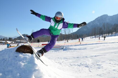 Mädchen auf dem Snowboard