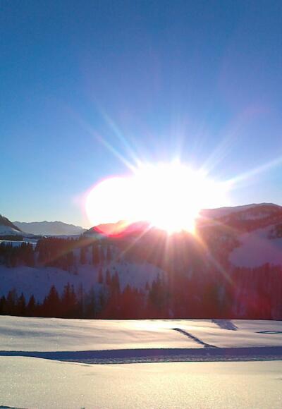Sonnenuntergang an der Panoramaloipe Postalm