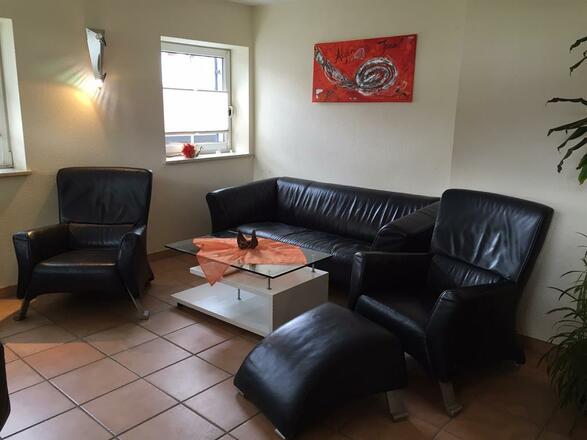 Wohnzimmer mit Rolf Benz Ledersofa