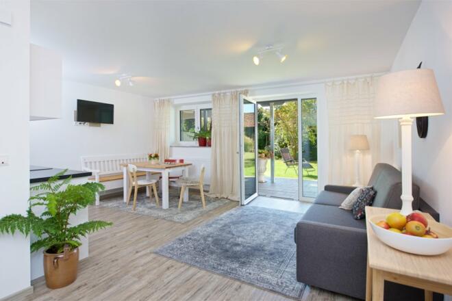 wohnraum-schlafsofa-studio-hotel-scheidegg-ebenerdig