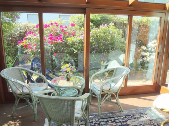 Wintergarten mit Süd- Terrasse