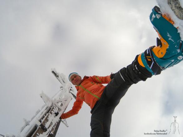 am Gipfelkreuz des Geigelstein