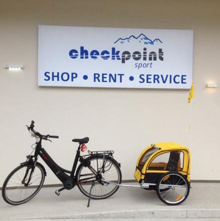 E-bike mit Kinderanhänger