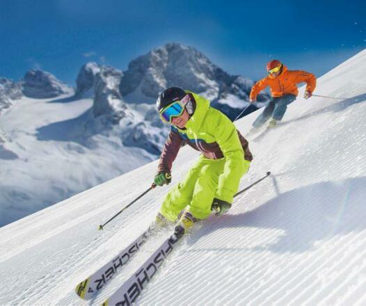 csm_Skifahrer-gruen-orange_bba47e383a