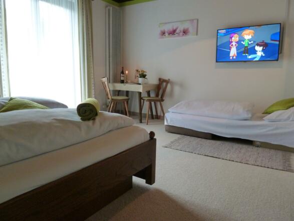 Dreibettzimmer mit Sofabett