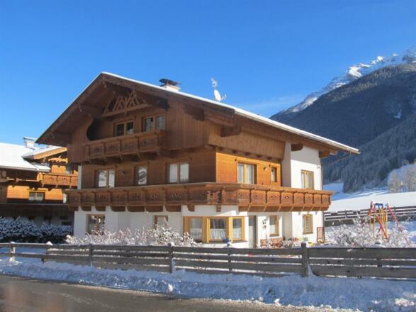 Winterfoto Haus Alpenmelodie