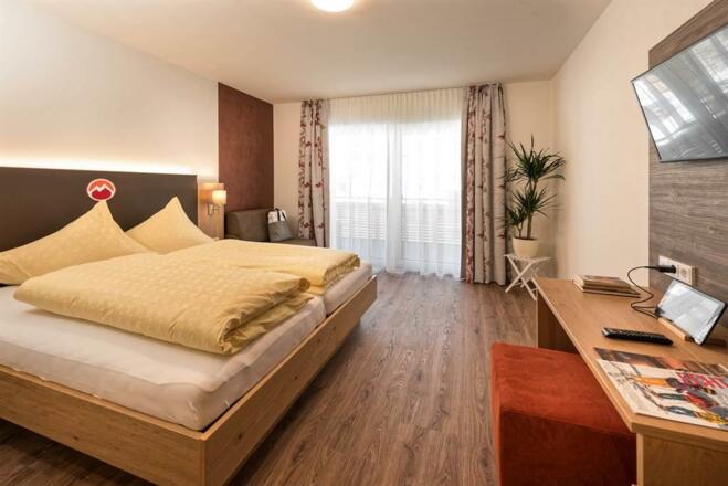 Hotel-Alpenfeuer-Montafon-Komfort-Doppelzimmer-Feu