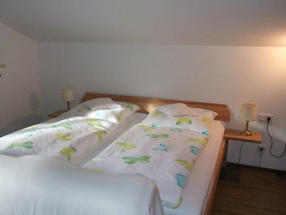 Schlafzimmer mit Doppelbetten