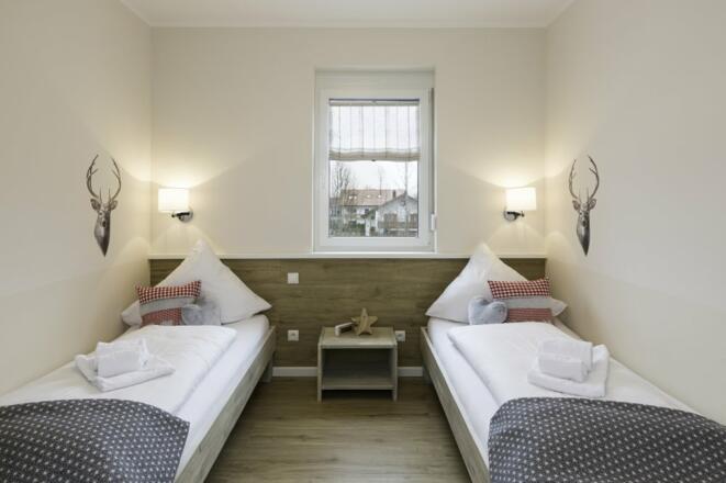 Zweites Schlafzimmer mit zwei Einzelbetten