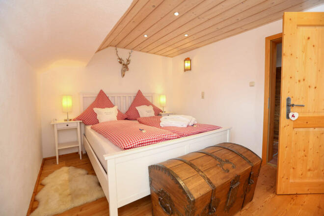 Schlafzimmer mit bequemen Betten