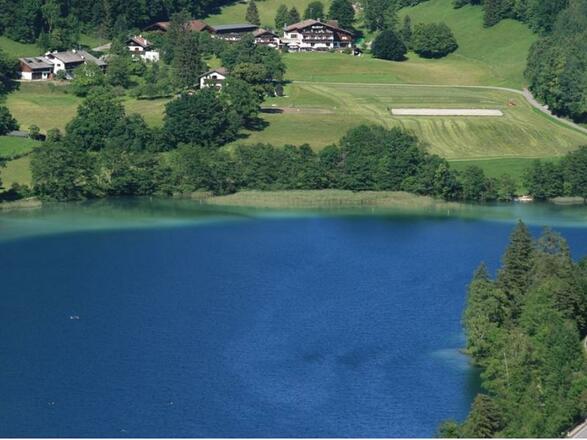 Blick auf Haus mit Thumsee