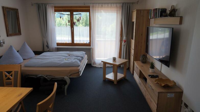 ausgeogene Schlafcouch