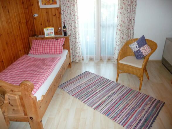 Schlafzimmer mit Balkon