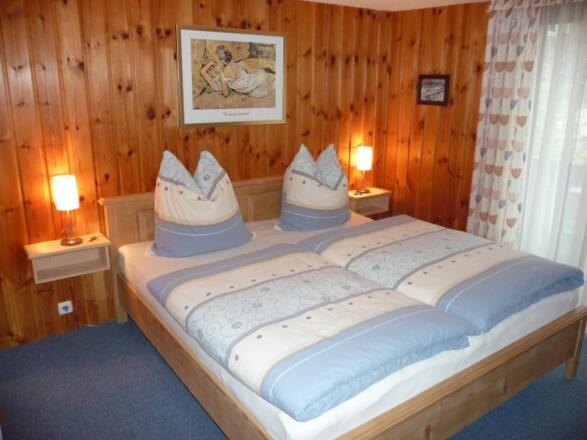 Schlafzimmer mit Balkon