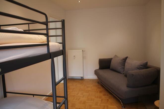 Schlafzimmer 2 mit Stockbett und Funktionssofa
