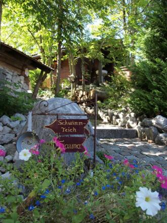 Blockhaus und Logo 125