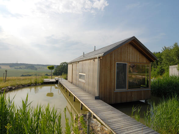 Wasserhaus im Teich