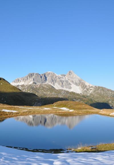 Tauernhöhenweg in Hüttennähe, Mosermandl in der Mitte mit Faulkogel