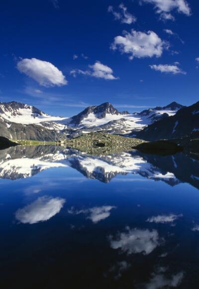 Mutterbergersee mit Alpenhauptkamm