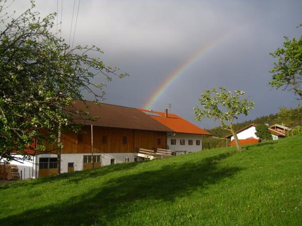 Haus mit Regenbogen