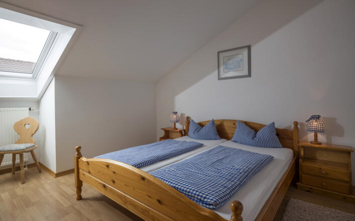 Schlafzimmer in der Ferienwohnung Brünnsteinblick