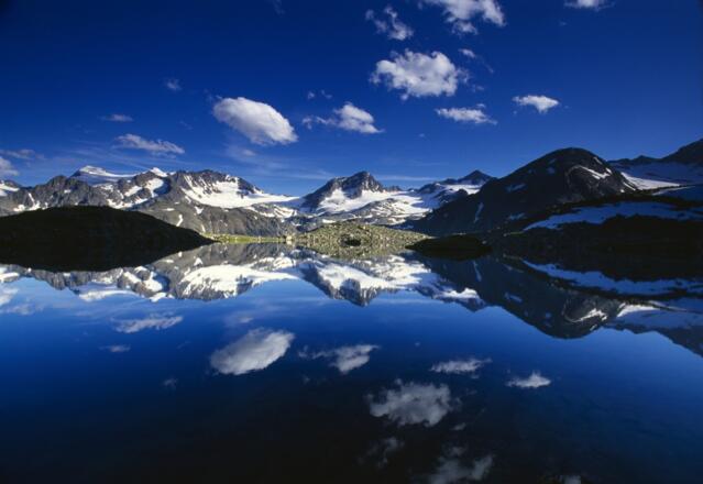 Mutterbergersee mit Alpenhauptkamm